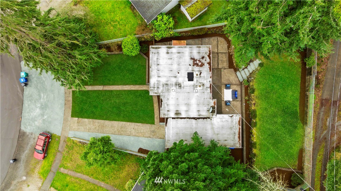 3012 Southwest 102nd Street Seattle, WA 98146 - Photo 32 of 32 an aerial view of a house with a yard