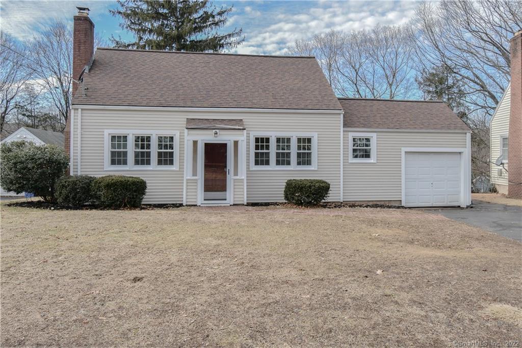 front view of house with a yard