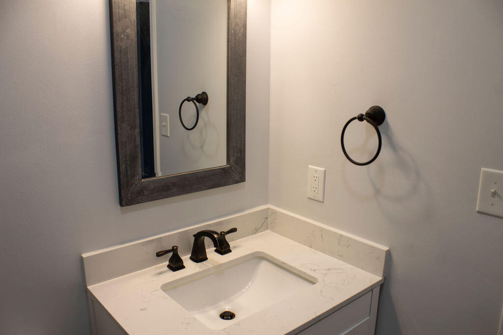 4438 Windsor Spring Road Hephzibah, GA 30815 - Photo 12 of 23 The bathrooms have new faucets and beautiful tile.