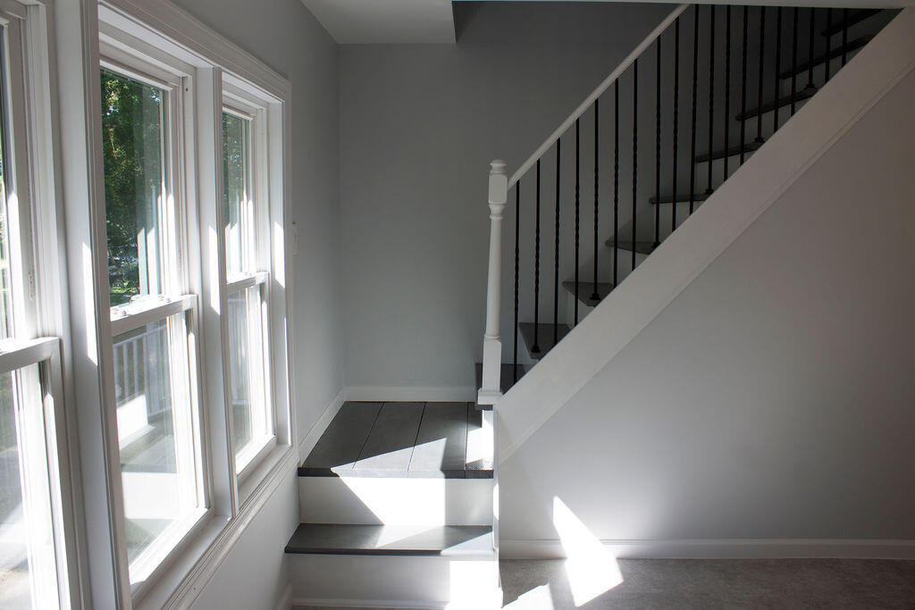 4438 Windsor Spring Road Hephzibah, GA 30815 - Photo 15 of 23 This private staircase takes you to the bedroom above the great room/flex space.