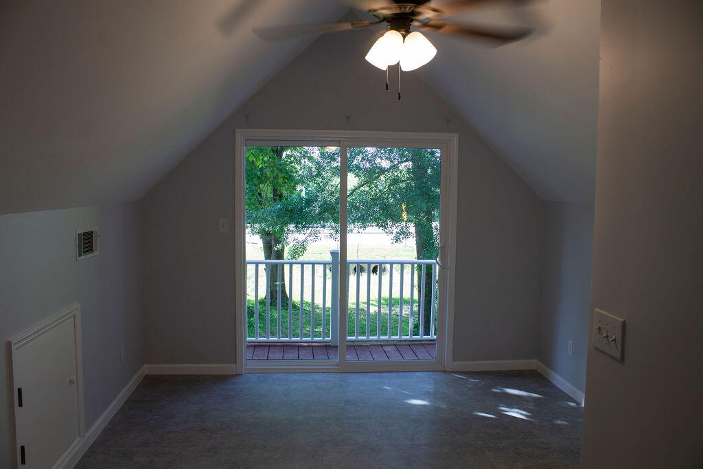 4438 Windsor Spring Road Hephzibah, GA 30815 - Photo 19 of 23 The masters bedroom is upstairs, accessible from its own set of stairs. It has a private balcony.