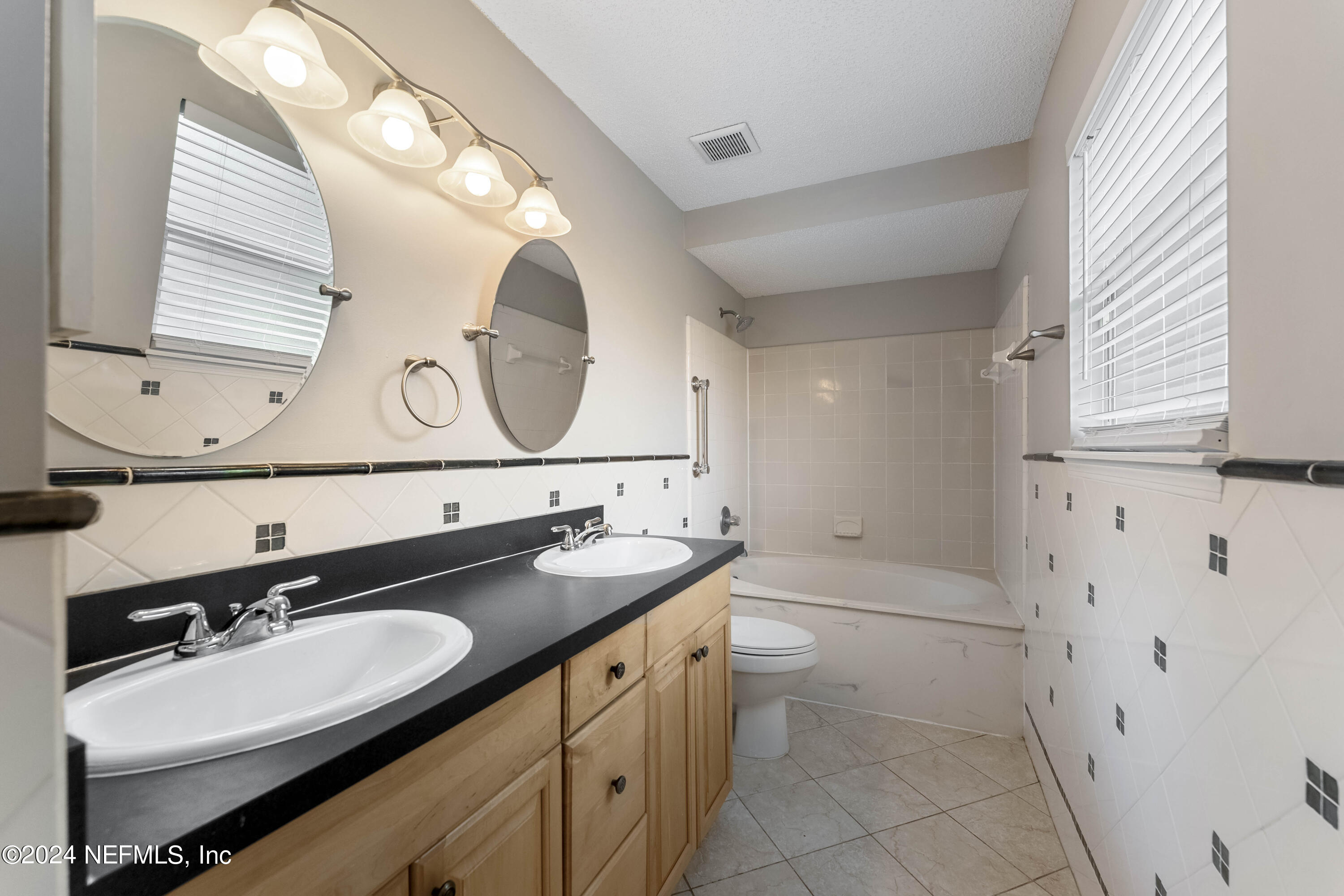 4504 Cobblefield Circle West Jacksonville, FL 32224 - Photo 12 of 22 12_Primary En-Suite