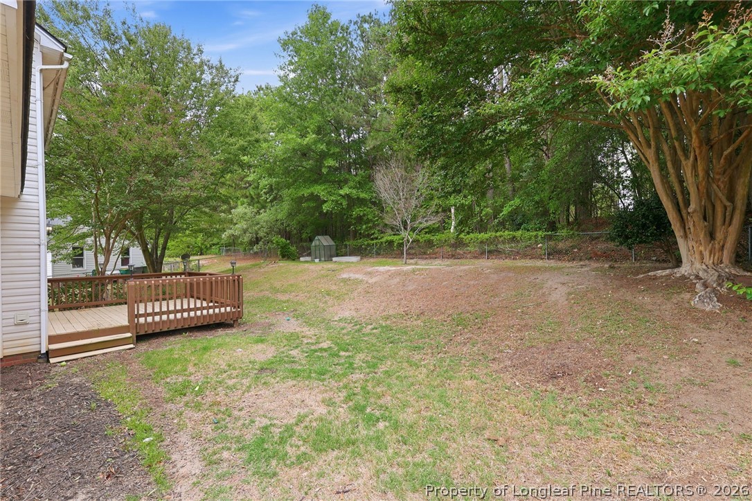5113 Archer Road Hope Mills, NC 28348 - Photo 38 of 41 a view of a backyard with a garden