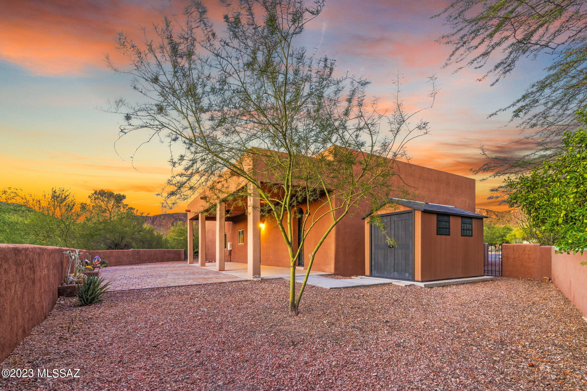 5670 Triangle X Place Tucson, AZ 85713 - Photo 32 of 36 a view of a house with a tree