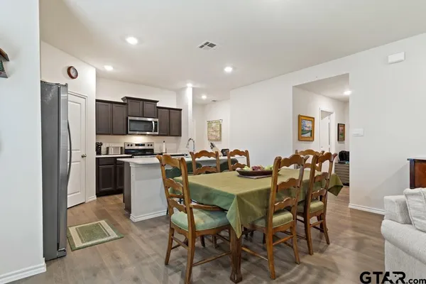 a view of a dining room with furniture