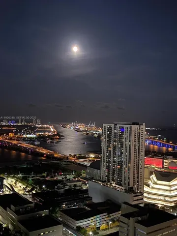 a room with lots of different colored cloths and green space
