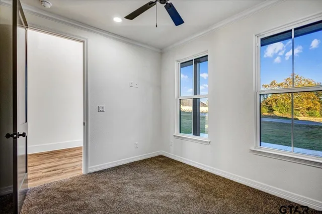 a view of an empty room and window