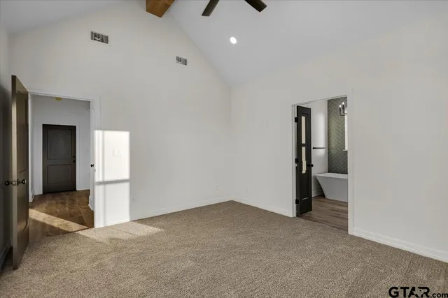 an empty room with a bathroom