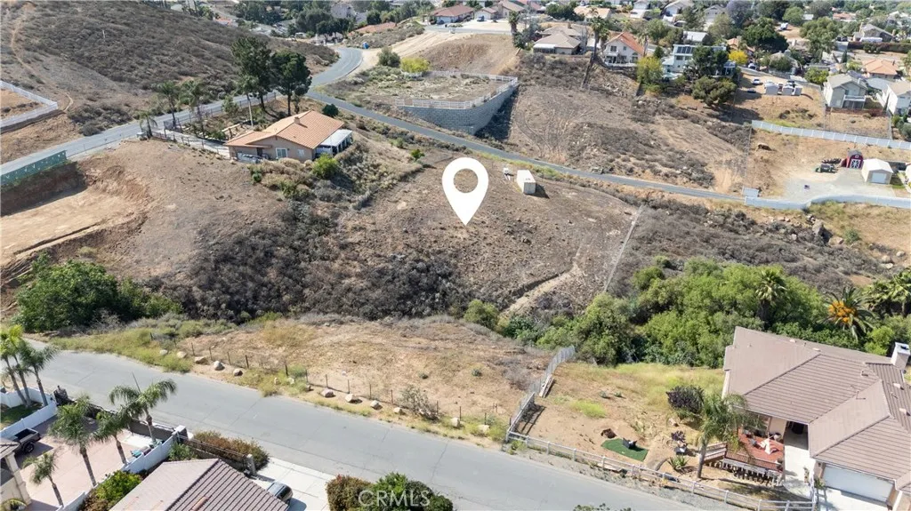 0 Seven Hills Drive Riverside, CA 92505 - Photo 5 of 11 an aerial view of a house with a yard covered with snow