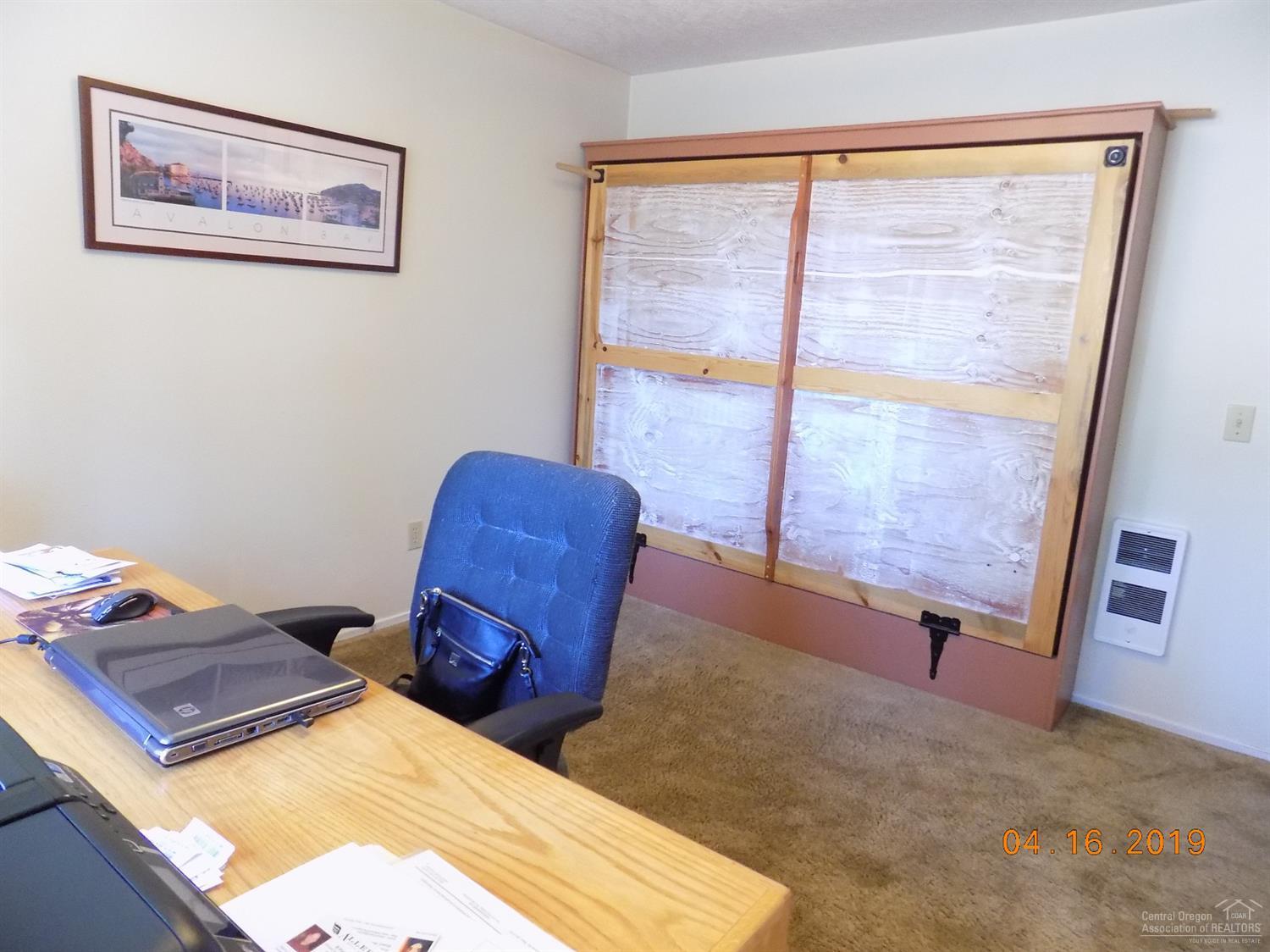 18853 Shoshone Road Bend, OR 97702 - Photo 19 of 25 Convenient Murphy bed included in sale.