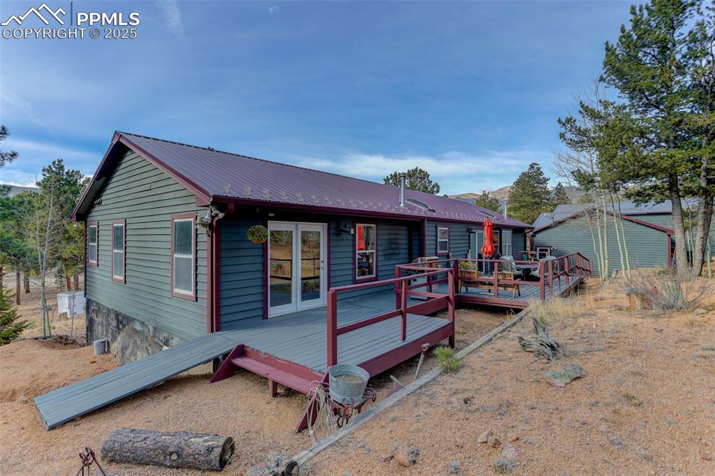 50 Rd P78 Bailey, CO 80421 - Photo 25 of 49 a view of a house with a patio and a yard