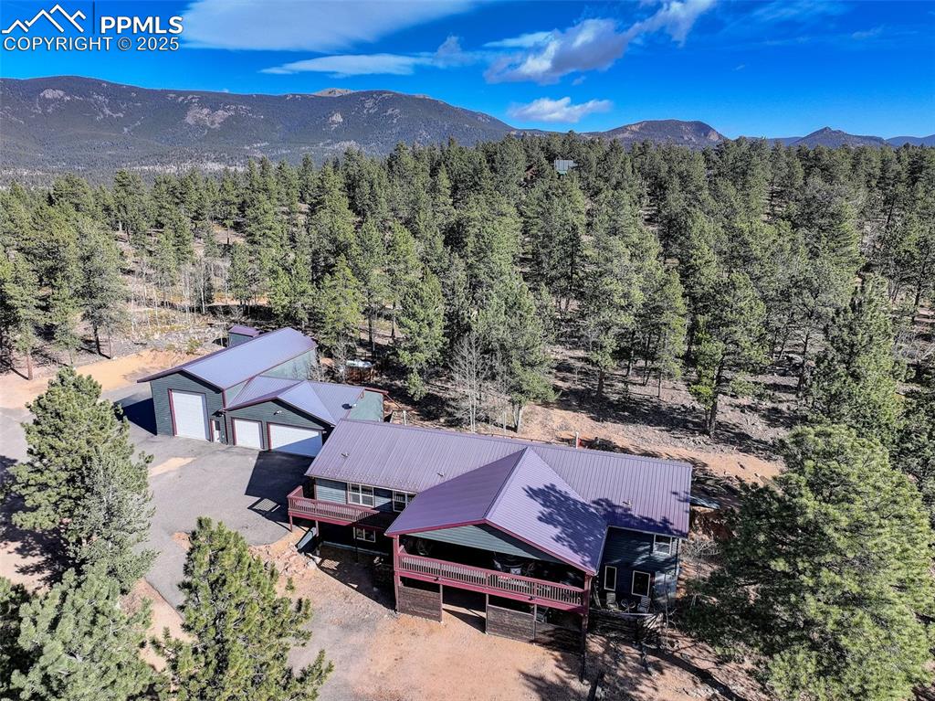 50 Rd P78 Bailey, CO 80421 - Photo 29 of 49 an aerial view of a house with a mountain