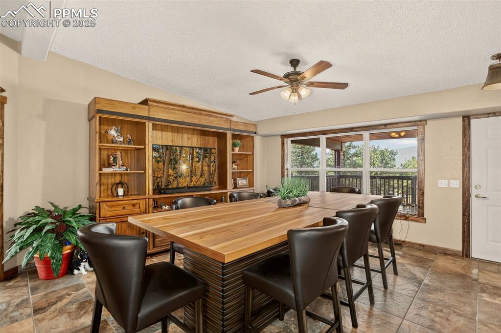 50 Rd P78 Bailey, CO 80421 - Photo 6 of 49 a view of a dining room with furniture window and outside view