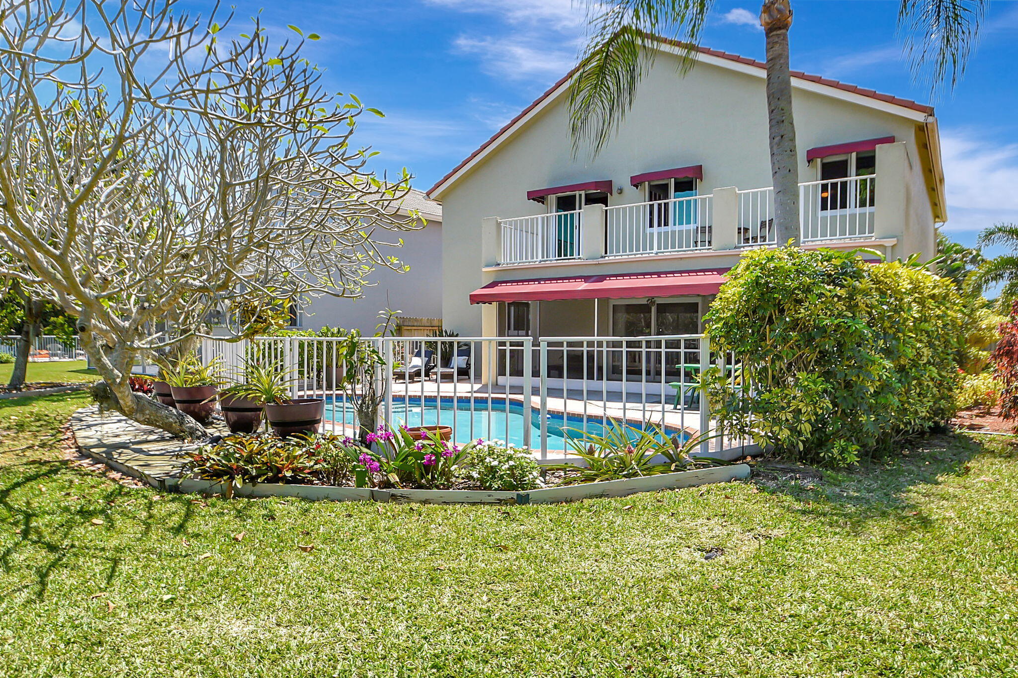 7319 Shell Ridge Terrace Lake Worth, FL 33467 - Photo 54 of 66 back of the house & pool