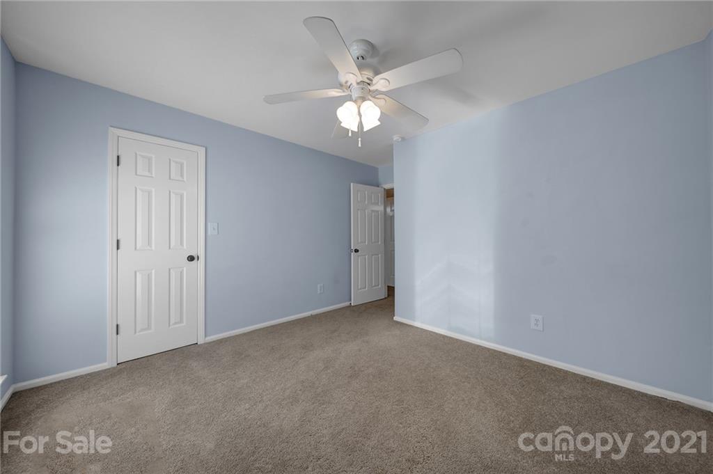 7032 Cambridge Circle Tega Cay, SC 29708 - Photo 24 of 36 a view of an empty room