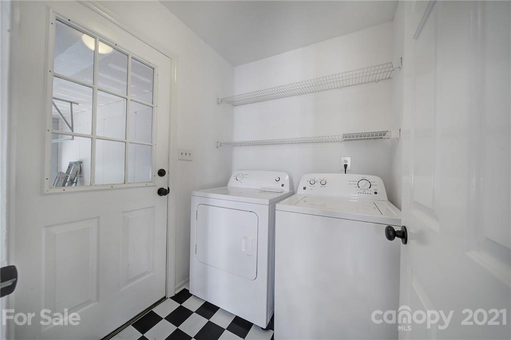 7032 Cambridge Circle Tega Cay, SC 29708 - Photo 28 of 36 a utility room with dryer and washer