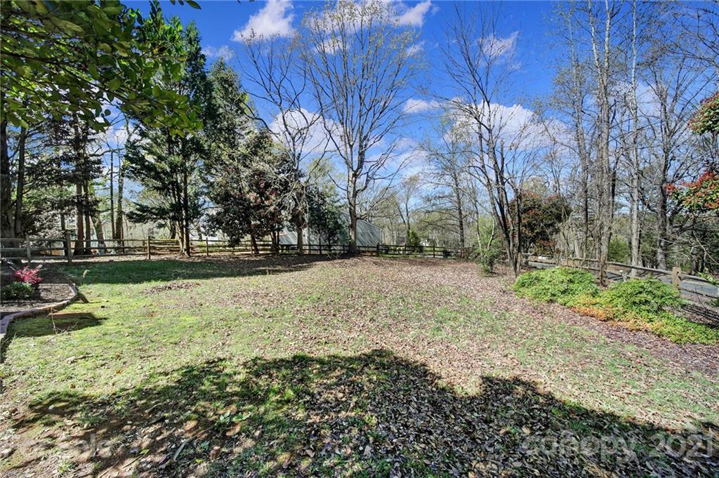 7032 Cambridge Circle Tega Cay, SC 29708 - Photo 33 of 36 a view of outdoor space with trees