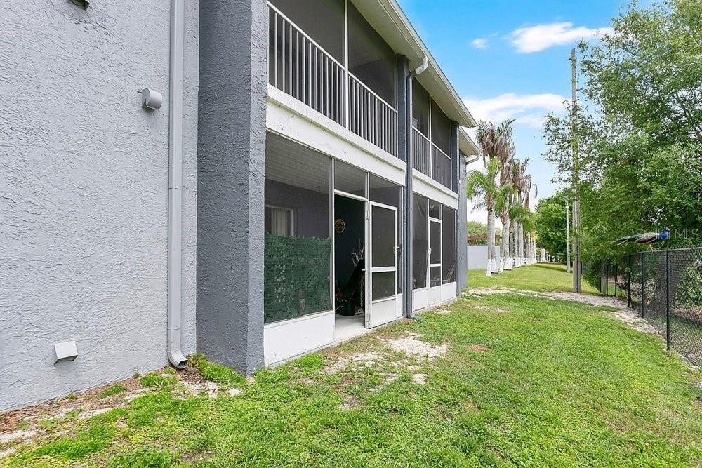4227 Pershing Pointe Place, Unit 2 Orlando, FL 32822 - Photo 19 of 34 a view of a house with brick walls