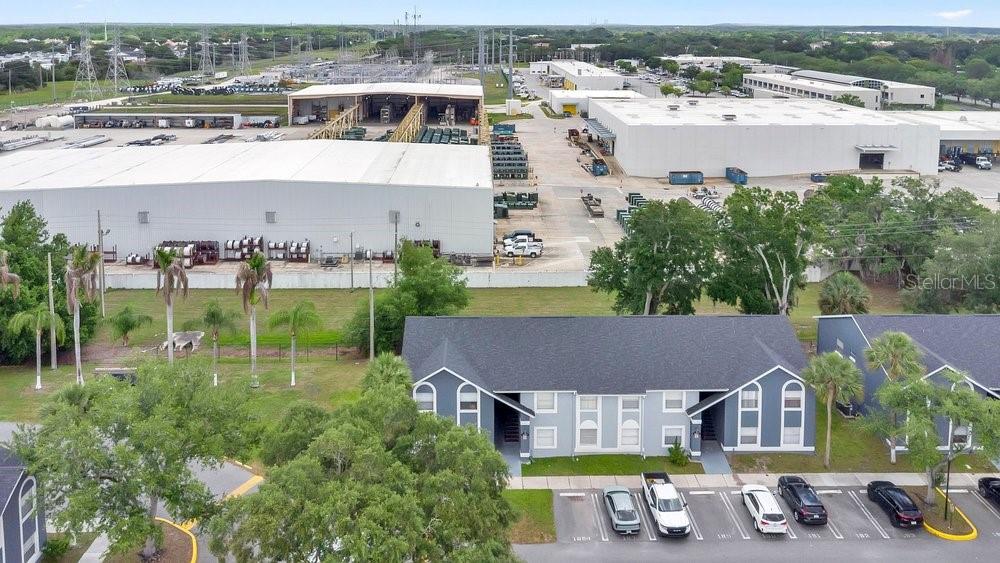 4227 Pershing Pointe Place, Unit 2 Orlando, FL 32822 - Photo 27 of 34 an aerial view of multiple houses with a yard
