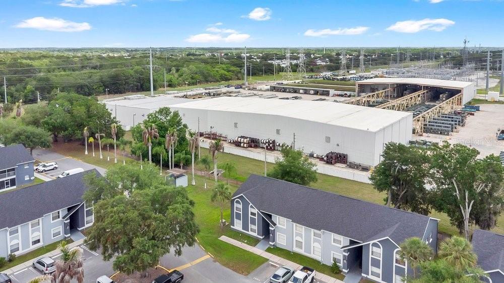4227 Pershing Pointe Place, Unit 2 Orlando, FL 32822 - Photo 28 of 34 a view of a city from a terrace