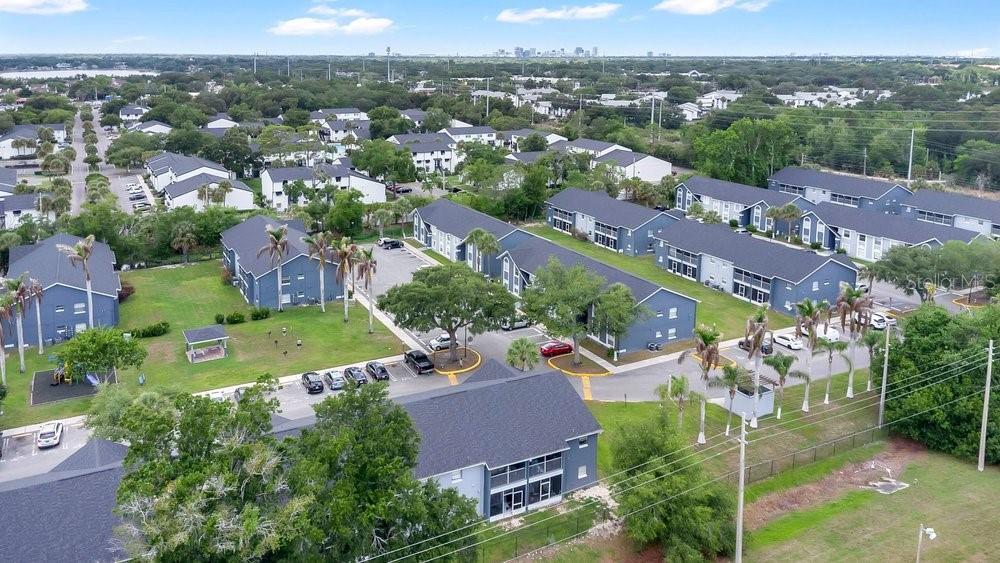 4227 Pershing Pointe Place, Unit 2 Orlando, FL 32822 - Photo 31 of 34 an aerial view of a city with lots of residential buildings