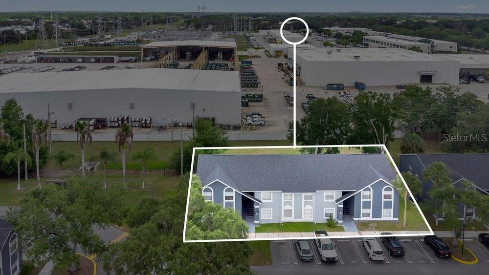 4227 Pershing Pointe Place, Unit 2 Orlando, FL 32822 - Photo 33 of 34 an aerial view of a house with garden space and street view