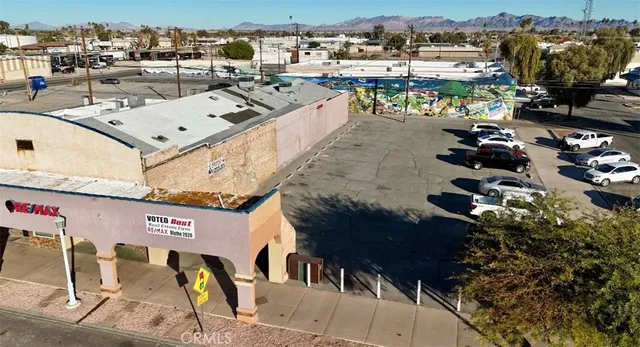 a view of swimming pool with outdoor seating