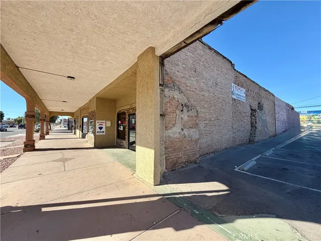 a view of a living room and bathroom
