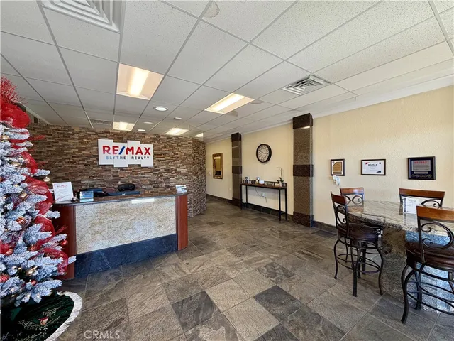 a room with furniture and flowers