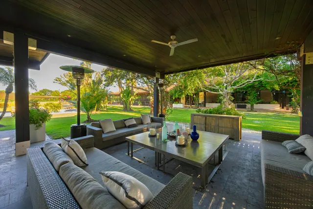 a view of a golf course with a swimming pool