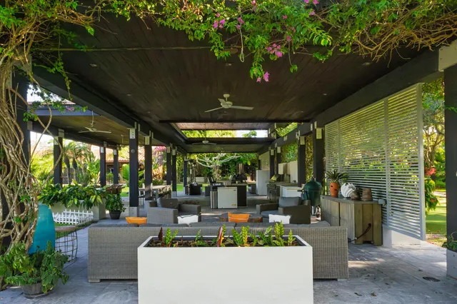 a view of a chairs and table in the patio