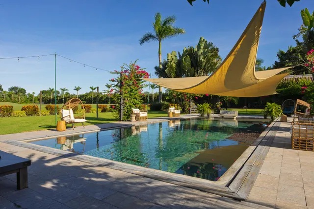 a bedroom with a bed closet and a window