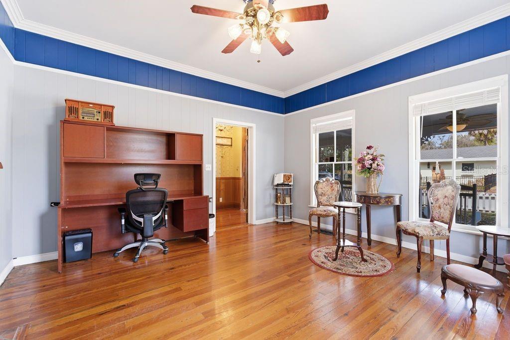 720 Southeast 3rd Street Ocala, FL 34471 - Photo 20 of 82 a view of a dining room with furniture and wooden floor