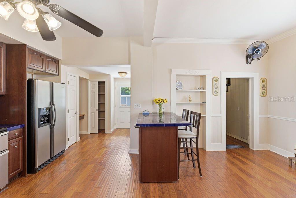 720 Southeast 3rd Street Ocala, FL 34471 - Photo 26 of 82 a view of a dining room with furniture and wooden floor