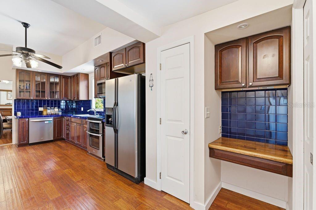 720 Southeast 3rd Street Ocala, FL 34471 - Photo 28 of 82 a kitchen with granite countertop stainless steel appliances and counter space