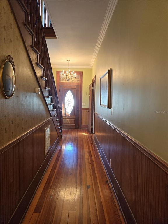 720 Southeast 3rd Street Ocala, FL 34471 - Photo 35 of 82 a view of entryway with wooden floor