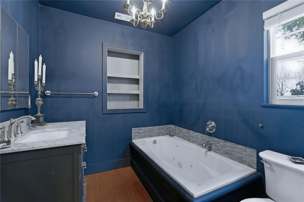720 Southeast 3rd Street Ocala, FL 34471 - Photo 37 of 82 a bathroom with a sink and a toilet