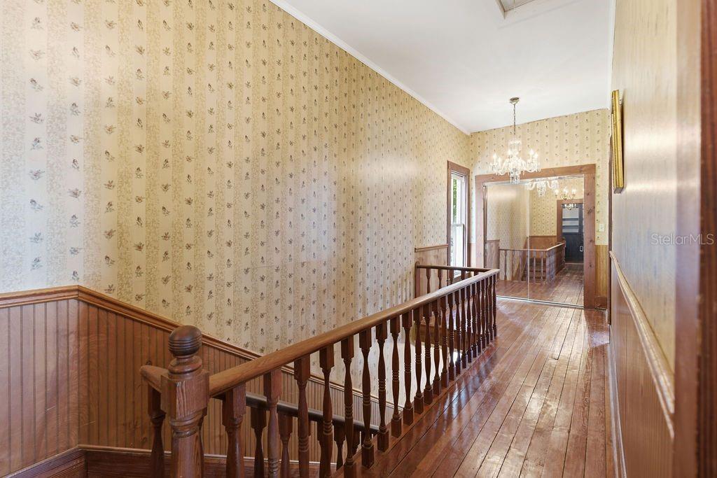 720 Southeast 3rd Street Ocala, FL 34471 - Photo 38 of 82 a view of gallery with wooden floor