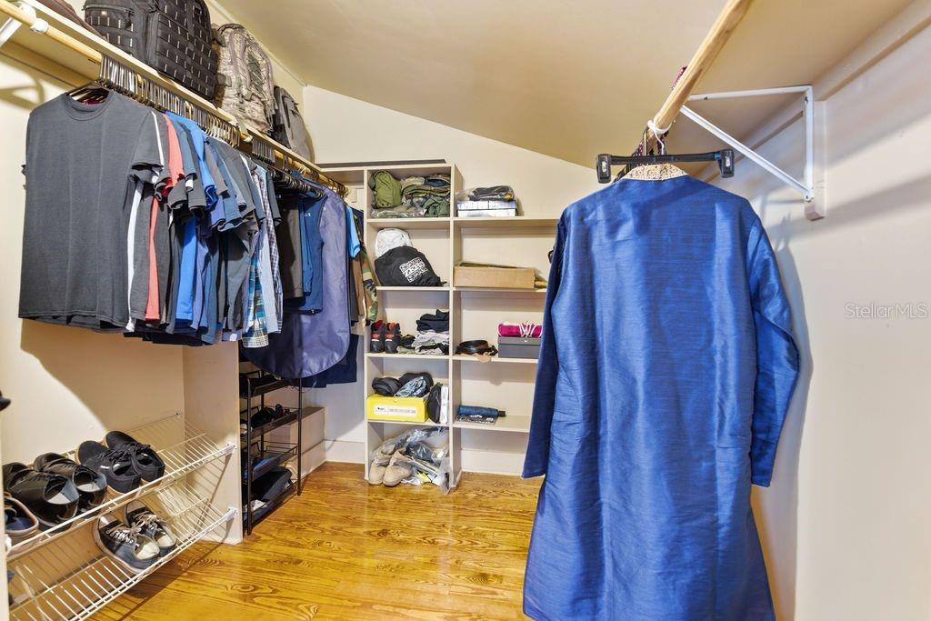 720 Southeast 3rd Street Ocala, FL 34471 - Photo 46 of 82 a view of walk in closet with clothes and shoes