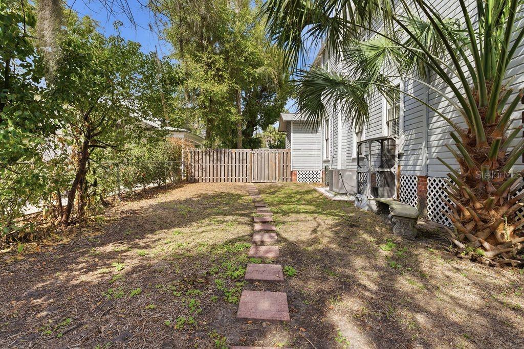 720 Southeast 3rd Street Ocala, FL 34471 - Photo 73 of 82 a view of a backyard with a tree