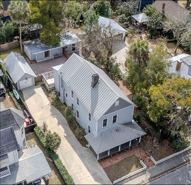 720 Southeast 3rd Street Ocala, FL 34471 - Photo 8 of 82 an aerial view of a house with a yard