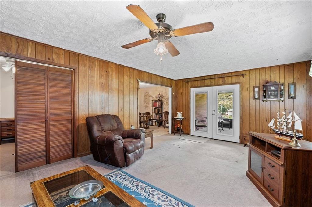 2880 Sherwood Road Southeast Smyrna, GA 30082 - Photo 16 of 33 a living room with furniture and a window