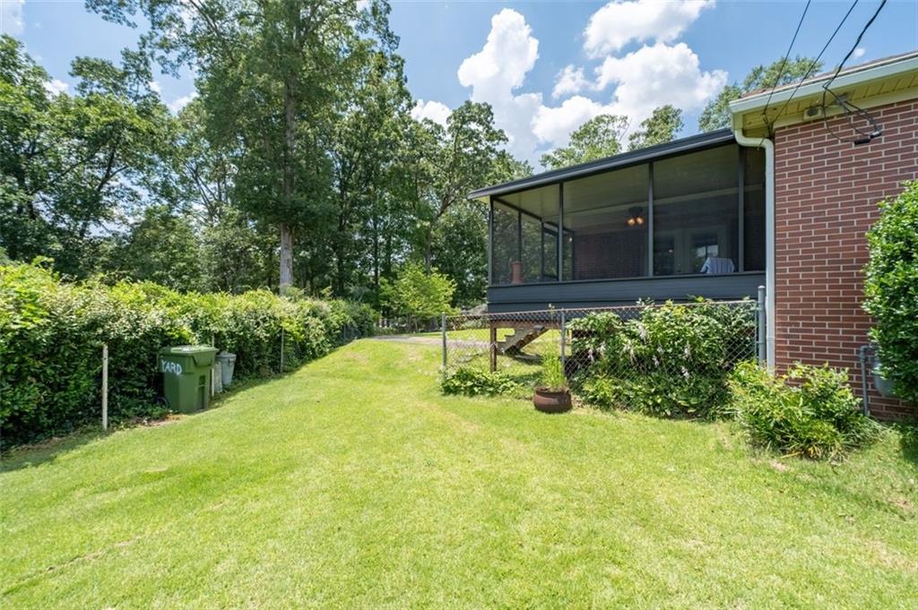 2880 Sherwood Road Southeast Smyrna, GA 30082 - Photo 31 of 33 a backyard of a house with lots of green space