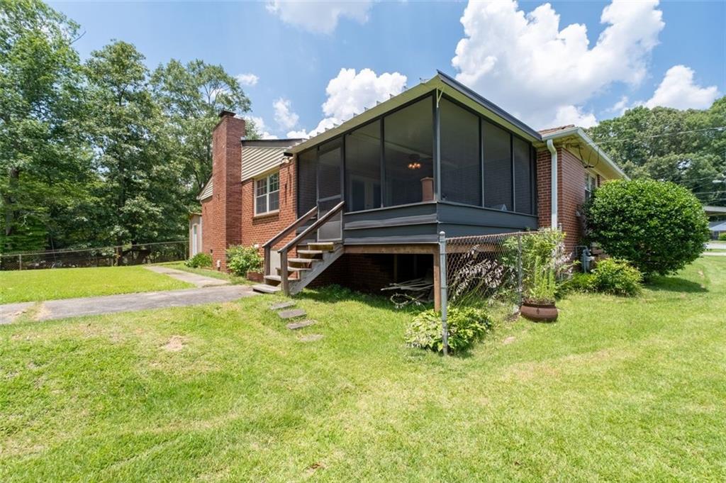 2880 Sherwood Road Southeast Smyrna, GA 30082 - Photo 32 of 33 a view of a house with a yard