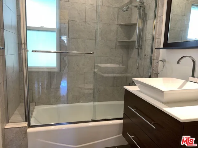 a bathroom with a sink and a bathtub
