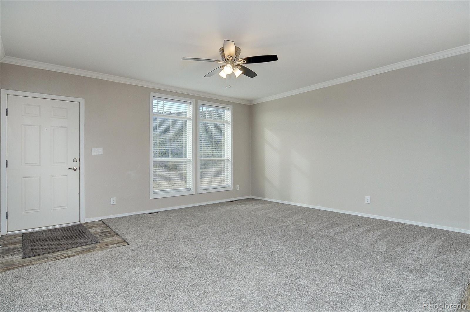 16554 Rocky Mountain Road Salida, CO 81201 - Photo 5 of 33 a view of an empty room with a window