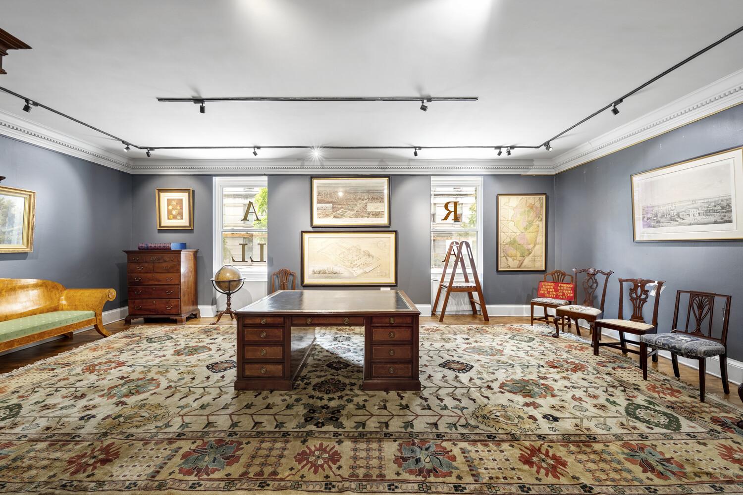 31 East 72nd Street, Unit 2 Manhattan, NY 10021 - Photo 3 of 12 a living room with furniture a rug and a window