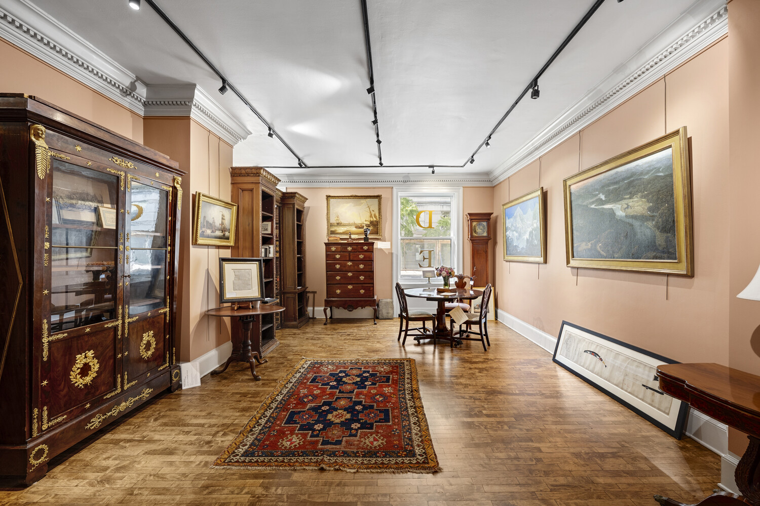 31 East 72nd Street, Unit 2 Manhattan, NY 10021 - Photo 5 of 12 a living room with furniture rug and window