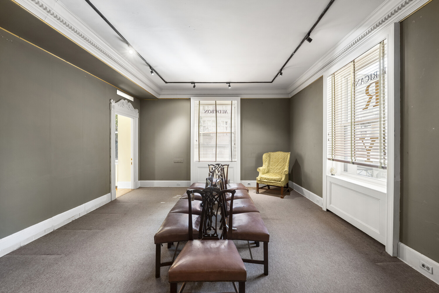 31 East 72nd Street, Unit 2 Manhattan, NY 10021 - Photo 8 of 12 a room with furniture and a large window