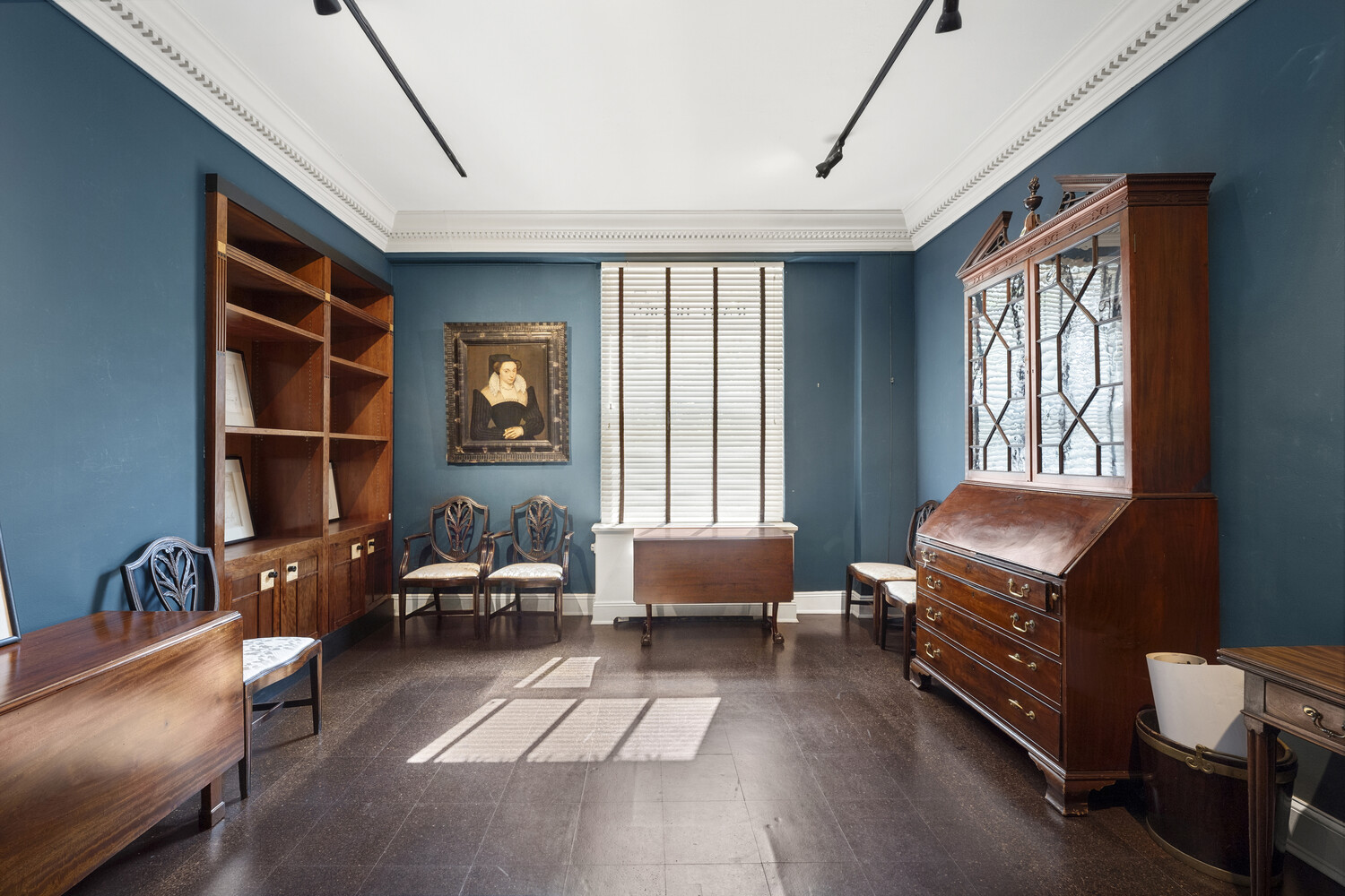 31 East 72nd Street, Unit 2 Manhattan, NY 10021 - Photo 9 of 12 a living room with furniture and a window